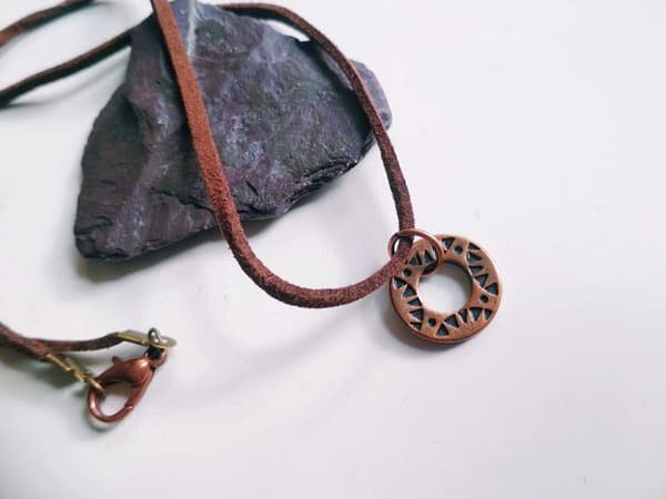 REPIOR BOND | Cervical Orbit | Suede, Brass
